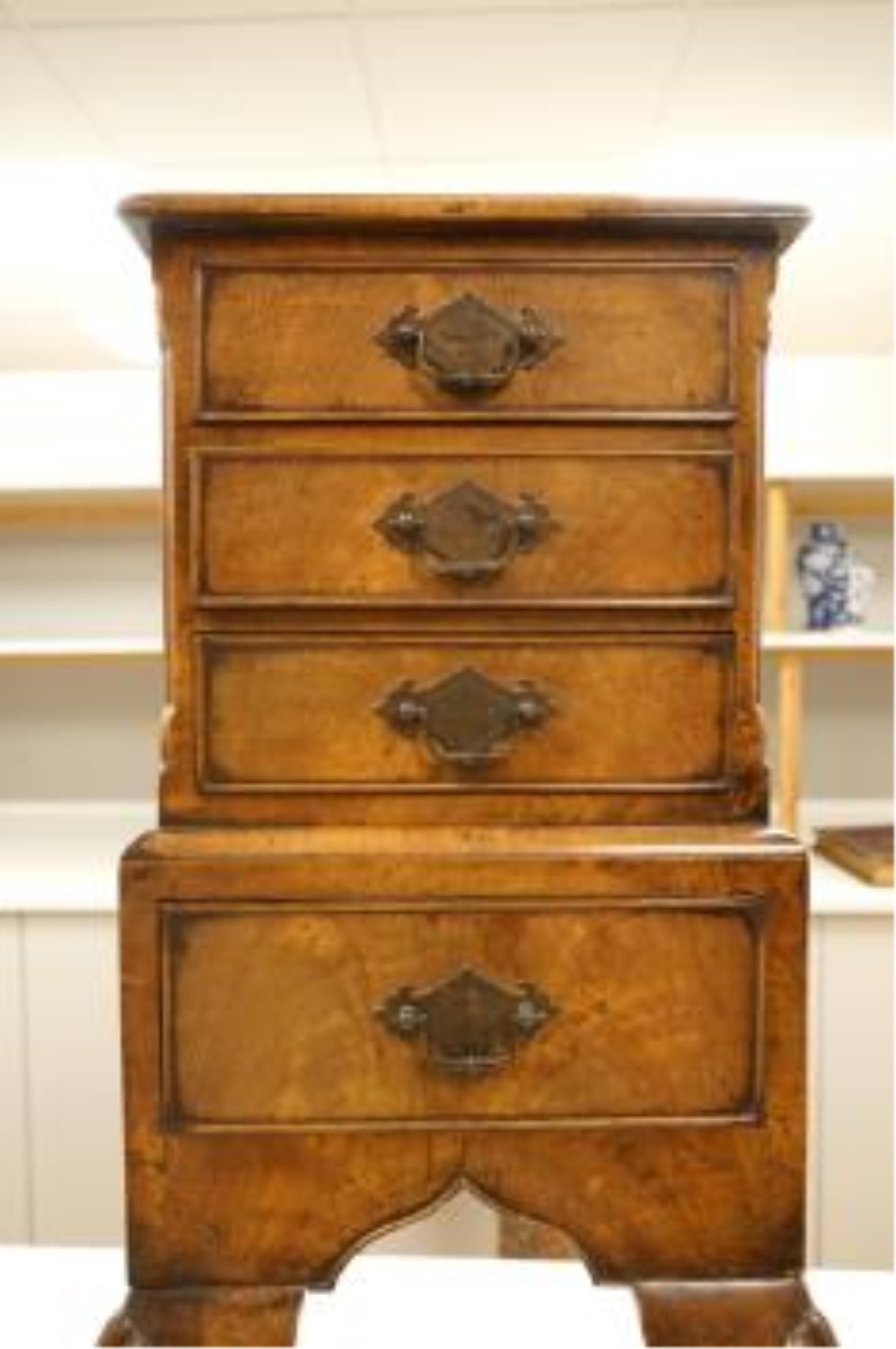 An early 20th century miniature walnut four drawer chest, 67cm